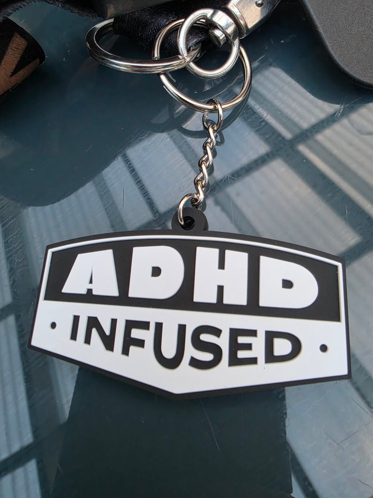3D rubber key tag.